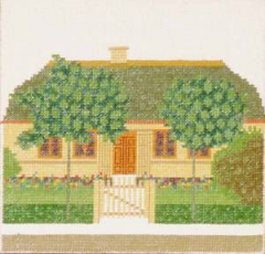 Strohdachhaus mit Garten
